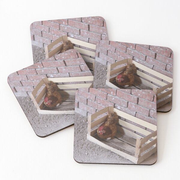 Item preview, Country hen lays her eggs in a wooden cage and looks at the camera designed and sold by zuhairiphotos.