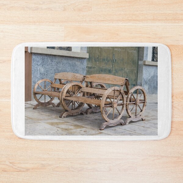 Item preview, Pair of Wooden Wagon Wheel Benches on Rustic Outdoor Courtyard Seating designed and sold by Nmallia.