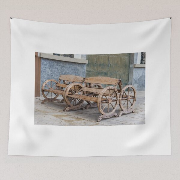 Item preview, Pair of Wooden Wagon Wheel Benches on Rustic Outdoor Courtyard Seating designed and sold by Nmallia.