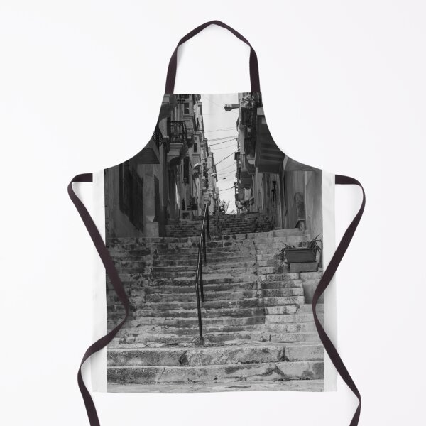 Item preview, Weathered Stone Steps With Iron Railing Beside Historic Urban Building In Monochrome designed and sold by Nmallia.