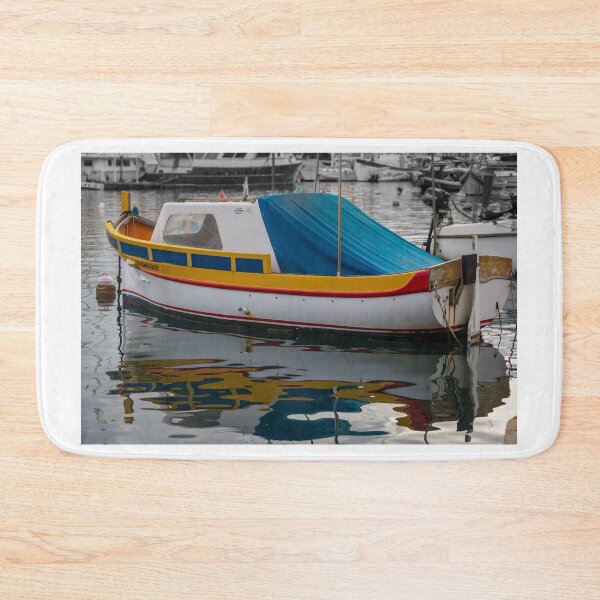 Item preview, Colorful Small Fishing Boat Docked in Harbor With Blue Cover and Water Reflection designed and sold by Nmallia.