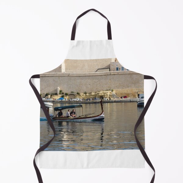 Item preview, Traditional Maltese Dgħajsa Boat Carrying Tourists Along Valletta Harbour With Limestone Fortifications designed and sold by Nmallia.