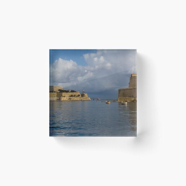 Item preview, Historic Mediterranean Harbor With Stone Fort, Calm Water and Dramatic Cloud Sky designed and sold by Nmallia.