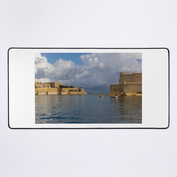 Item preview, Historic Mediterranean Harbor With Stone Fort, Calm Water and Dramatic Cloud Sky designed and sold by Nmallia.