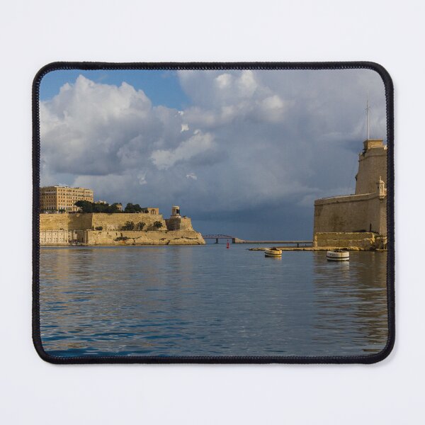 Item preview, Historic Mediterranean Harbor With Stone Fort, Calm Water and Dramatic Cloud Sky designed and sold by Nmallia.