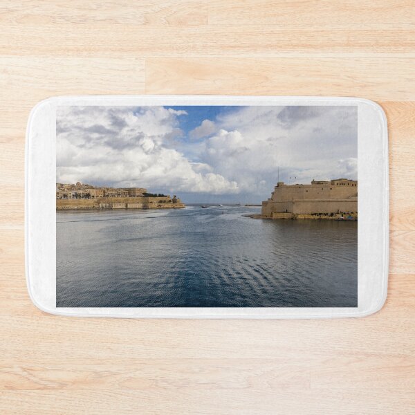 Item preview, Historic Mediterranean Harbor With Stone Fort, Calm Water and Dramatic Cloud Sky designed and sold by Nmallia.
