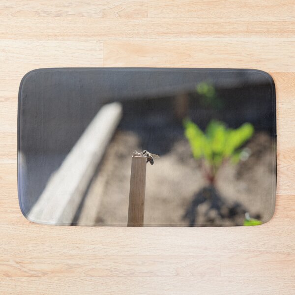 Item preview, Honey Bee Resting on a Wooden Stake in a Garden designed and sold by zuhairiphotos.