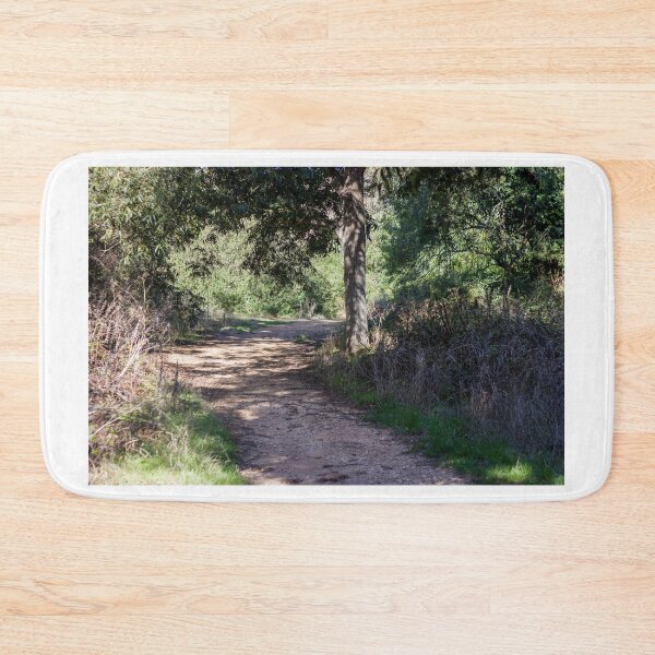 Item preview, Sunlit Forest Trail Through Oaks and Shrubbery With Dirt Path and Overhanging Tree Shade designed and sold by Nmallia.