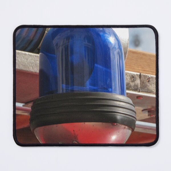 Item preview, Blue Emergency Beacon Light on Red Emergency Vehicle Close Up With Metal Hose and Reflection designed and sold by Nmallia.