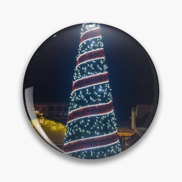 Item preview, Christmas Tree With Blue Lights In City Street At Night Surrounded By Shoppers And Festive Decorations designed and sold by Nmallia.
