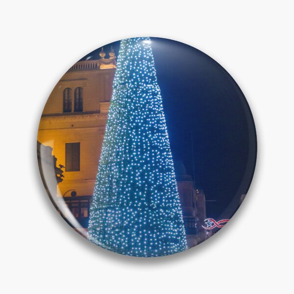 Item preview, Christmas Tree With Blue Lights In City Street At Night Surrounded By Shoppers And Festive Decorations designed and sold by Nmallia.