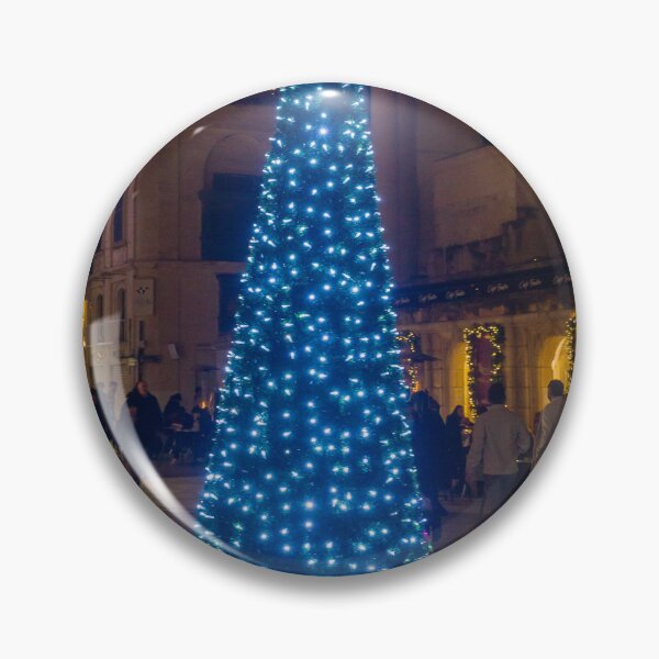 Item preview, Christmas Tree With Blue Lights In City Street At Night Surrounded By Shoppers And Festive Decorations designed and sold by Nmallia.