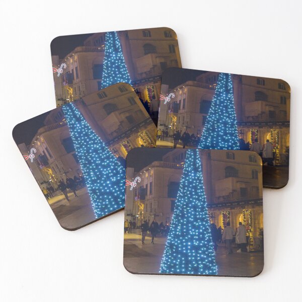 Item preview, Christmas Tree With Blue Lights In City Street At Night Surrounded By Shoppers And Festive Decorations designed and sold by Nmallia.