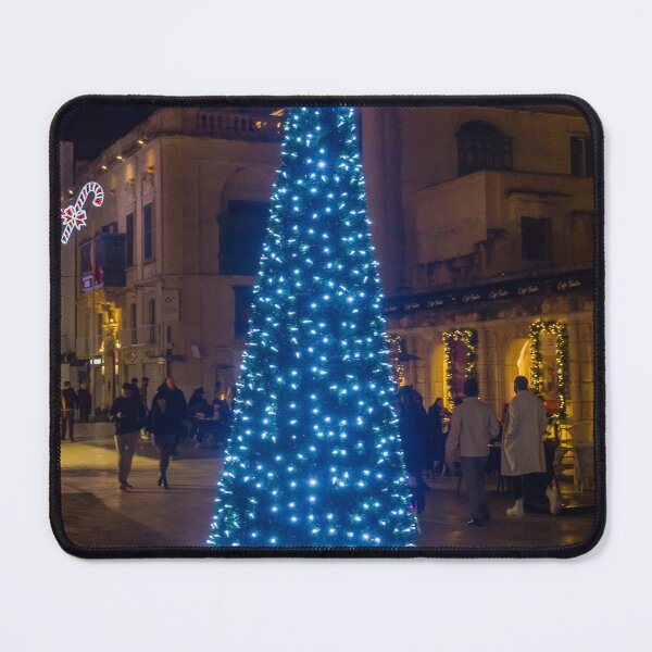 Item preview, Christmas Tree With Blue Lights In City Street At Night Surrounded By Shoppers And Festive Decorations designed and sold by Nmallia.