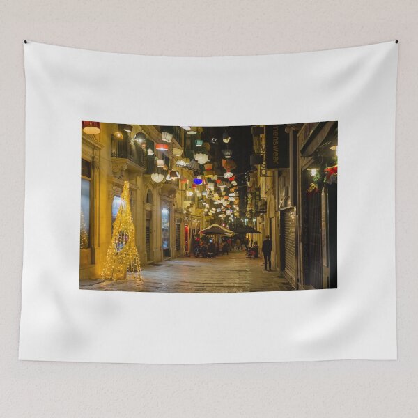 Item preview, Festive Night Street With Hanging Lamps, Christmas Lights and Outdoor Cafes in European City designed and sold by Nmallia.
