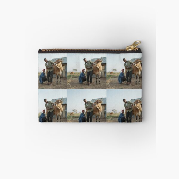 Item preview, African Livestock Farmers Inspecting Brahman Bull designed and sold by SavannaCanvas.