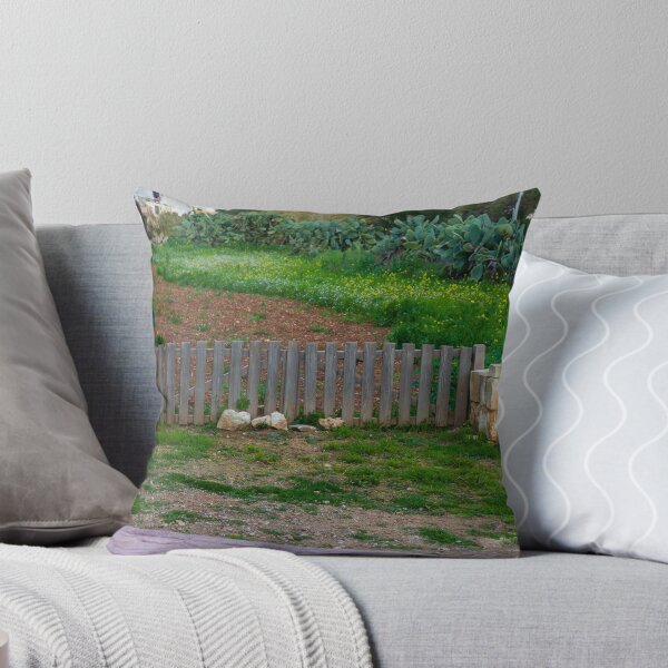 Item preview, Rustic Wooden Gate Between Stone Walls Leading To Green Field With Cactus In Rural Village designed and sold by Nmallia.