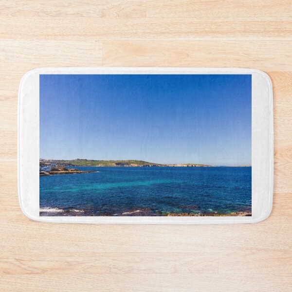 Item preview, Tranquil Blue Seascape With Rocky Coastline, Clear Sky and Distant Shoreline Panorama designed and sold by Nmallia.