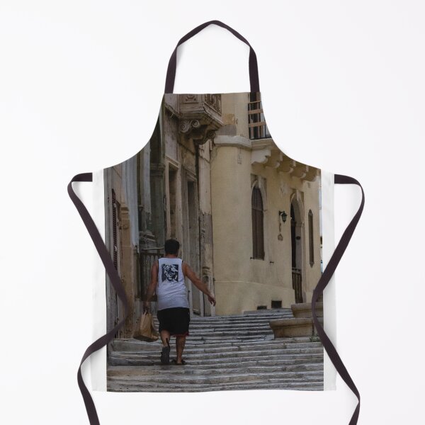 Item preview, Man Walking Up Historic Stone Steps Through Narrow Old Town Street With Warm Mediterranean Architecture designed and sold by Nmallia.