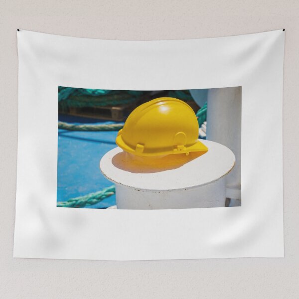 Item preview, Yellow Safety Hard Hat Resting on Ship Deck Bollard With Coiled Ropes - Marine Safety Concept designed and sold by Nmallia.