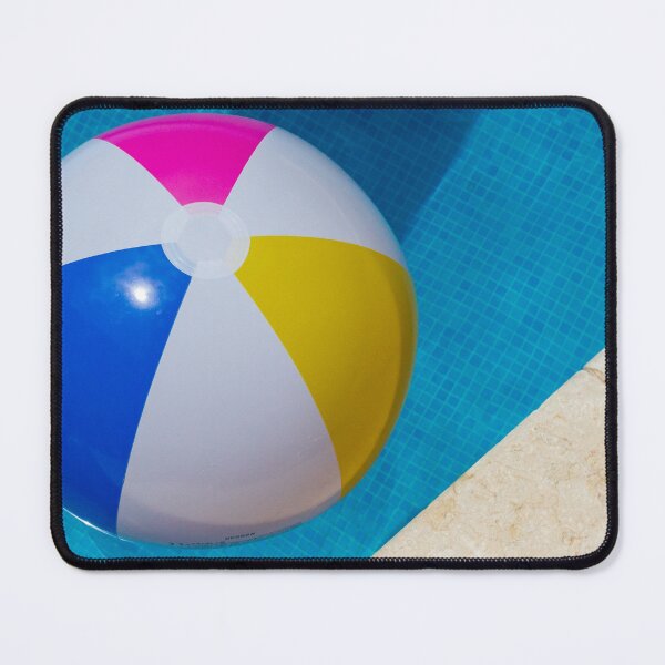 Item preview, Colorful Beach Ball Floating in Blue Swimming Pool Next to Stone Pool Deck on Sunny Day designed and sold by Nmallia.