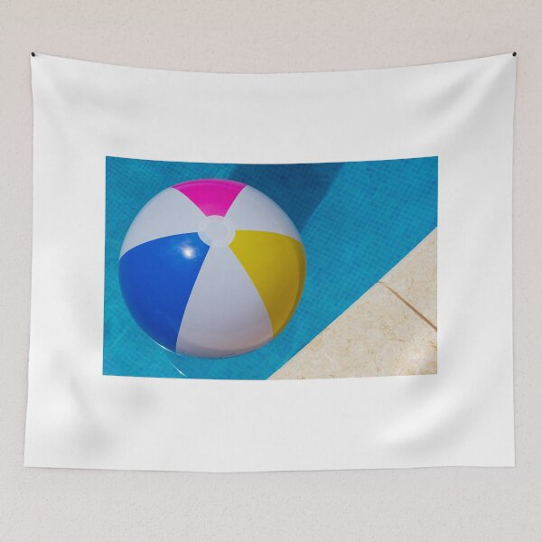 Item preview,  Colorful Beach Ball Floating in Blue Swimming Pool Next to Stone Pool Deck on Sunny Day designed and sold by Nmallia.