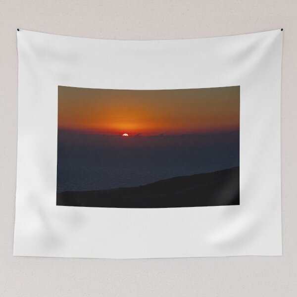 Item preview, Dramatic Orange Sunset Over Calm Ocean Horizon With Silhouetted Coastal Landscape At Dusk designed and sold by Nmallia.