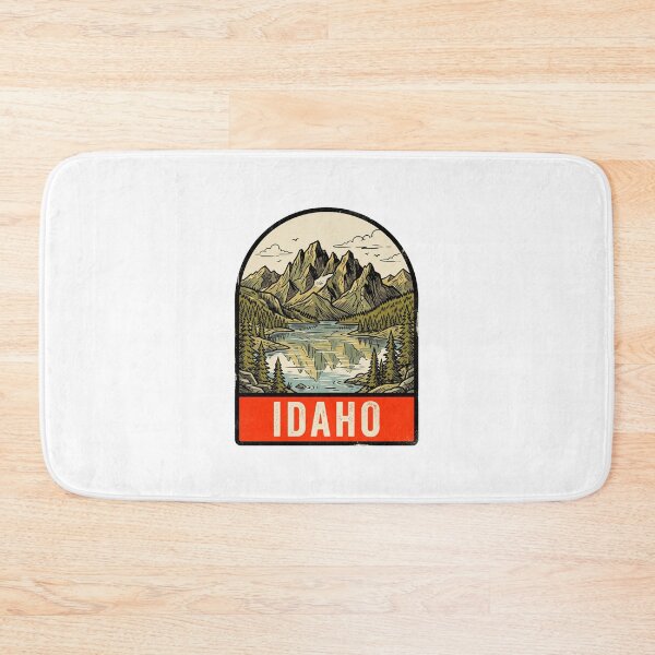Item preview, Vintage Idaho Rocky Mountains Lake Retro Travel Badge designed and sold by Paper Drip.