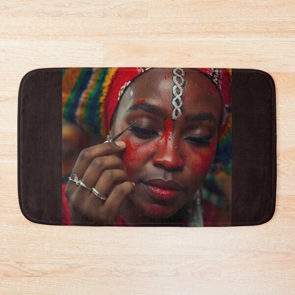 Item preview, African Woman Applying Traditional Festival Face Paint designed and sold by SavannaCanvas.