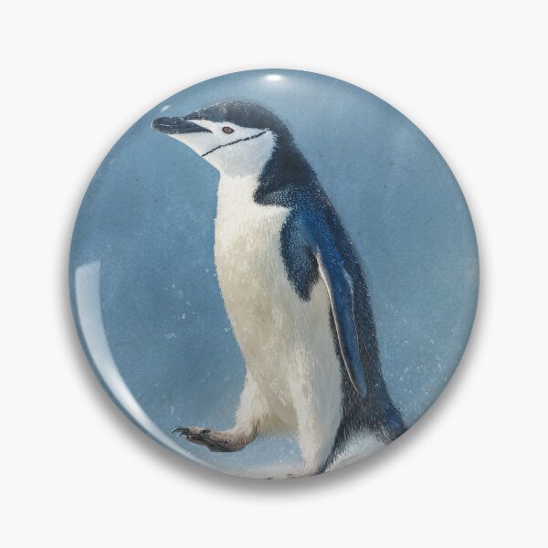 Item preview, Penguin walking across a snowy landscape with blue background designed and sold by Sasas Design.