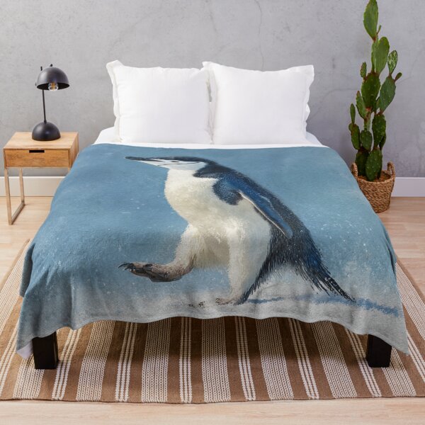 Item preview, Penguin walking across a snowy landscape with blue background designed and sold by Sasas Design.