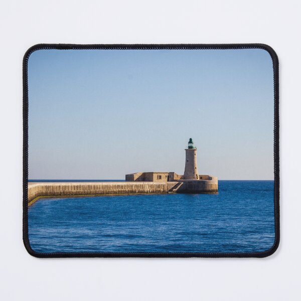 Item preview, Lighthouse on a Stone Pier Over Calm Blue Sea Under Clear Sky at Coastal Breakwater designed and sold by Nmallia.