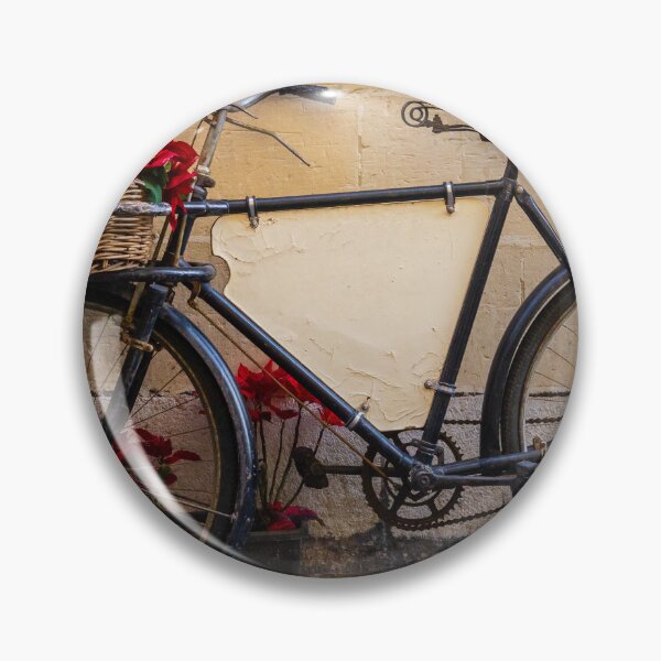 Item preview, Vintage Bicycle With Wicker Basket of Red Poinsettias Leaning Against Rustic Wall on Street designed and sold by Nmallia.