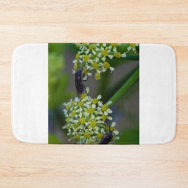 Item preview, Macro Shot Of Two Flies Feeding On Yellow Umbel Flowers In Natural Green Garden Setting designed and sold by Nmallia.