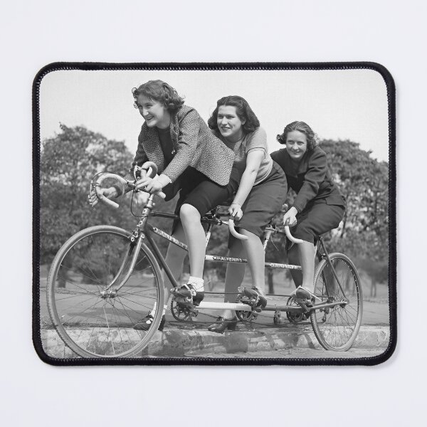 Item preview, Bicycle Riders Trio, Vintage Black and White Photo designed and sold by IconicArchive.