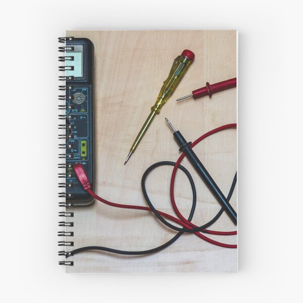 Item preview, Digital Multimeter With Red and Black Probes and Screwdriver On Wooden Workbench for Electronics Measurement and Repair designed and sold by Nmallia.
