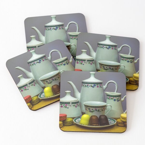 Item preview, Elegant Porcelain Tea Set With Colorful Macarons and Chocolates on Wooden Table designed and sold by Nmallia.