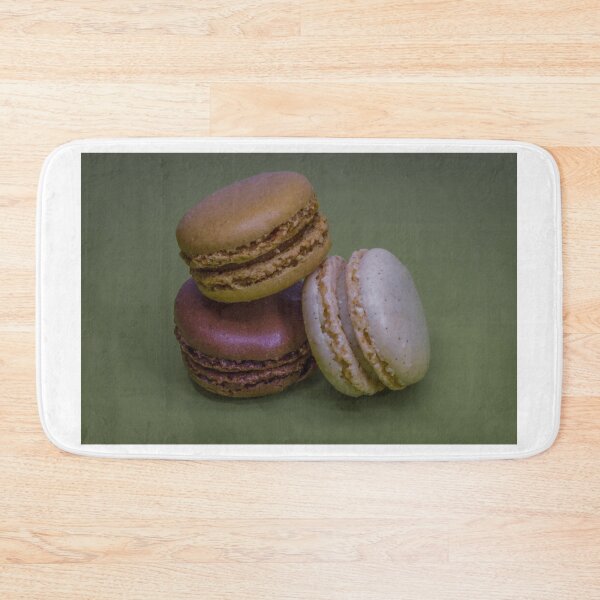 Item preview, Three French Macarons Stacked on Green Background — Vanilla, Chocolate and Pistachio Pastry designed and sold by Nmallia.