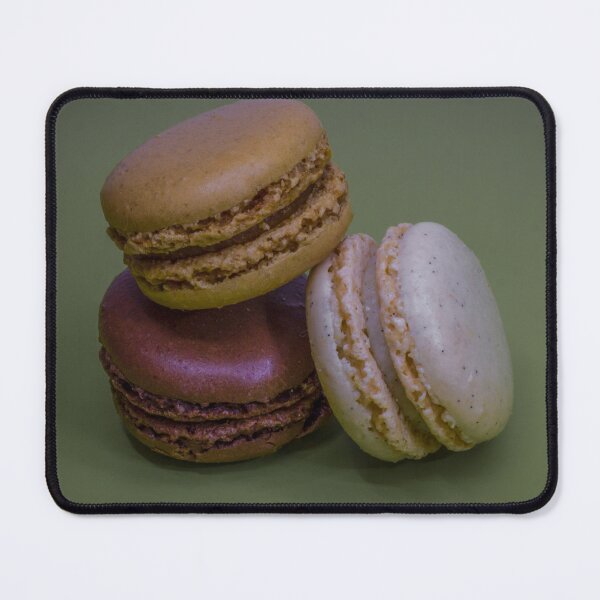 Item preview, Three French Macarons Stacked on Green Background — Vanilla, Chocolate and Pistachio Pastry designed and sold by Nmallia.