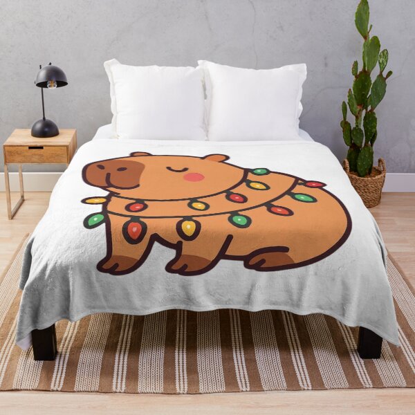 Item preview, Cozy Holiday Capybara - Christmas Kawall Sticker designed and sold by foryouandyours.