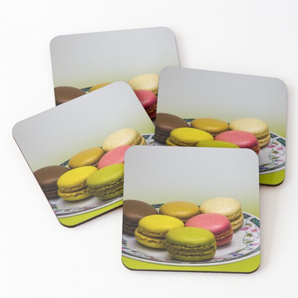 Item preview, Colorful French Macarons Assorted On A Decorative Plate Over Green Background designed and sold by Nmallia.