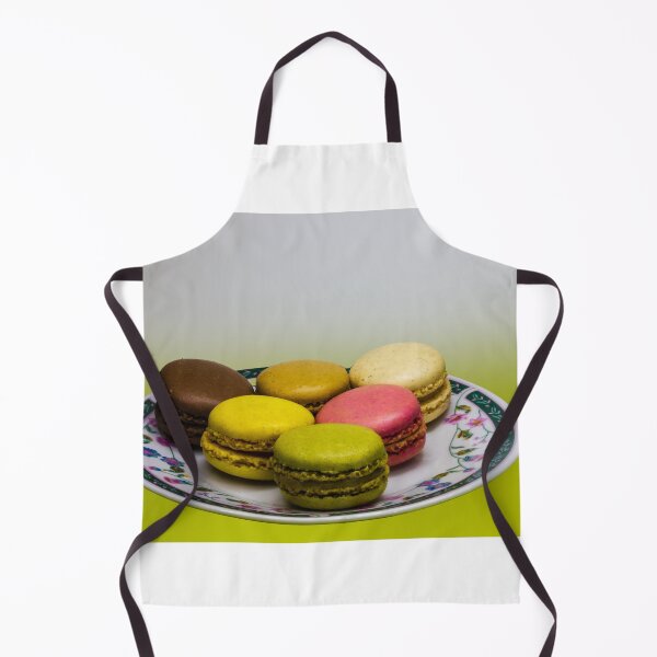 Item preview, Colorful French Macarons Assorted On A Decorative Plate Over Green Background designed and sold by Nmallia.
