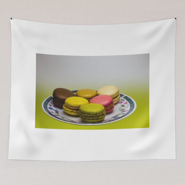 Item preview, Colorful French Macarons Assorted On A Decorative Plate Over Green Background designed and sold by Nmallia.