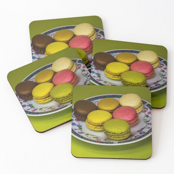 Item preview, Colorful French Macarons Assorted On A Decorative Plate Over Green Background designed and sold by Nmallia.
