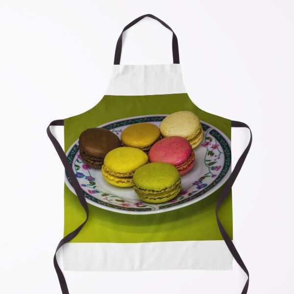 Item preview, Colorful French Macarons Assorted On A Decorative Plate Over Green Background designed and sold by Nmallia.