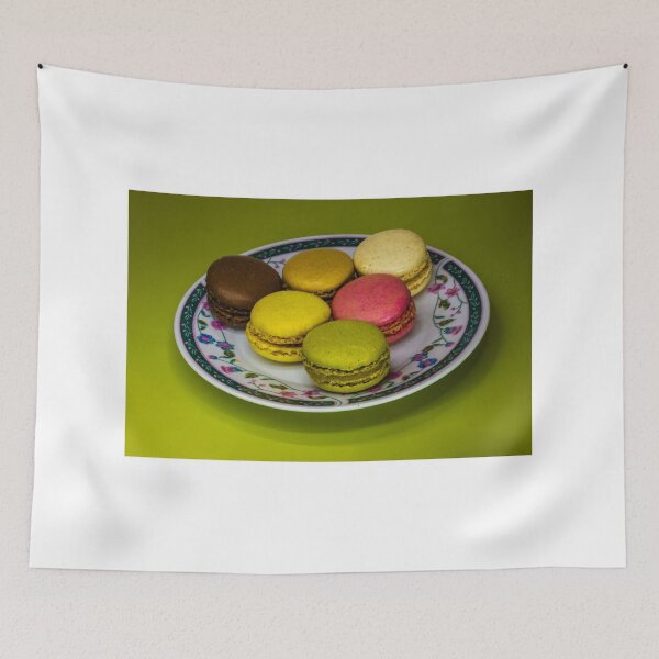 Item preview, Colorful French Macarons Assorted On A Decorative Plate Over Green Background designed and sold by Nmallia.