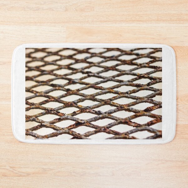 Item preview, Closeup of Rusty Metal Mesh Grate Showing Corroded Diamond Pattern and Weathered Industrial Texture designed and sold by Nmallia.