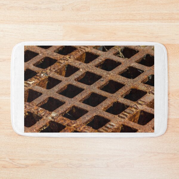 Item preview, Close-Up Of Rusty Metal Grate Drain With Square Openings Texture And Industrial Decay designed and sold by Nmallia.