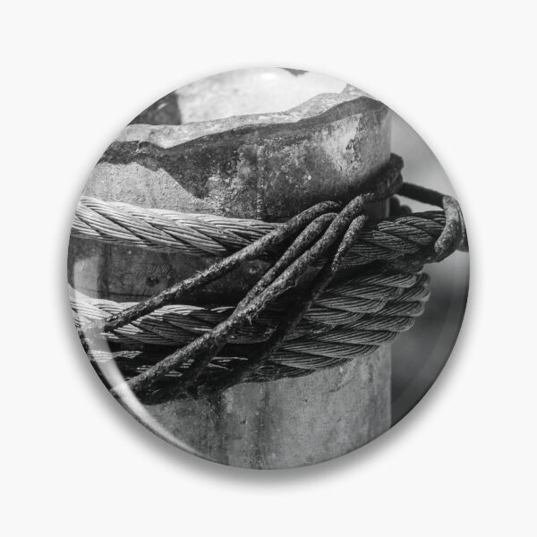 Item preview, Close-Up of Steel Cable and Rope Wrapped Around Weathered Mooring Post in Black and White designed and sold by Nmallia.