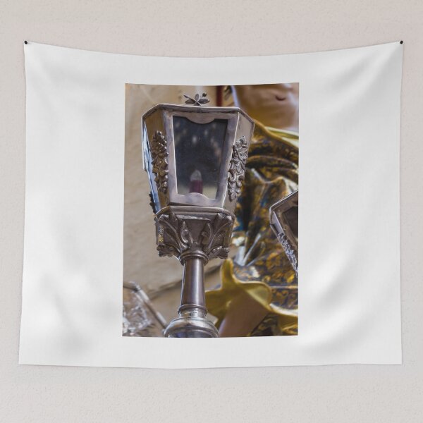 Item preview, Decorative Silver Lantern Closeup With Ornate Floral Relief On Religious Statue In Church Interior designed and sold by Nmallia.